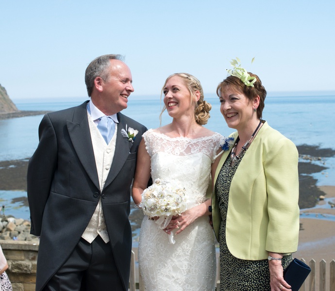  The Bride and her Parents at the Seaside Wedding in the UK | photo by Tracey Ann Photography / as seen on www.BrendasWeddingBlog.com 