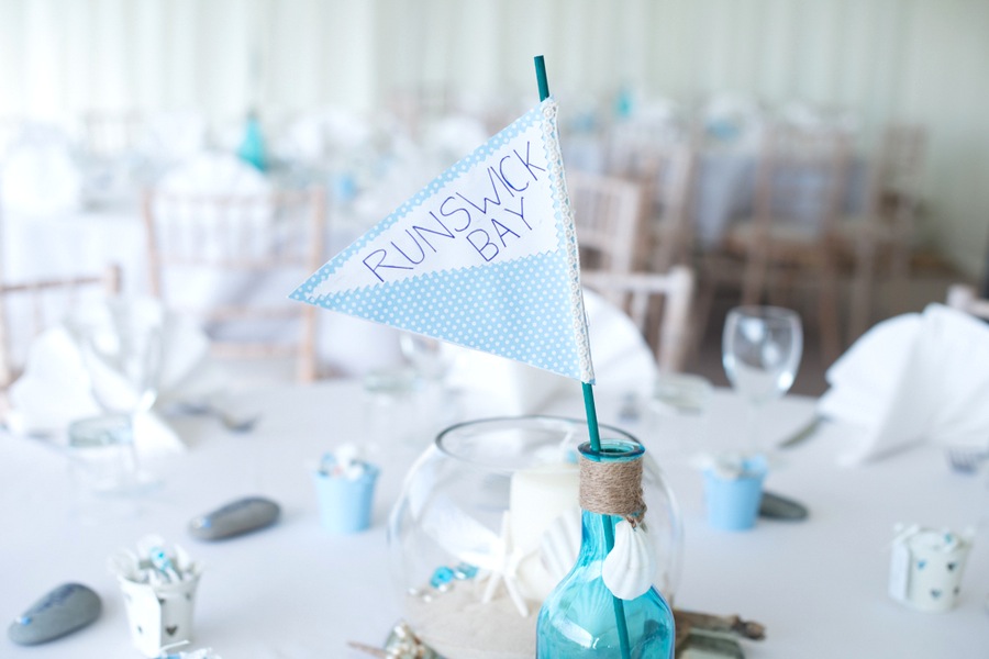  Cute Handmade Fabric Banner Flags for Table Numbers | photo by Tracey Ann Photography / as seen on www.BrendasWeddingBlog.com 