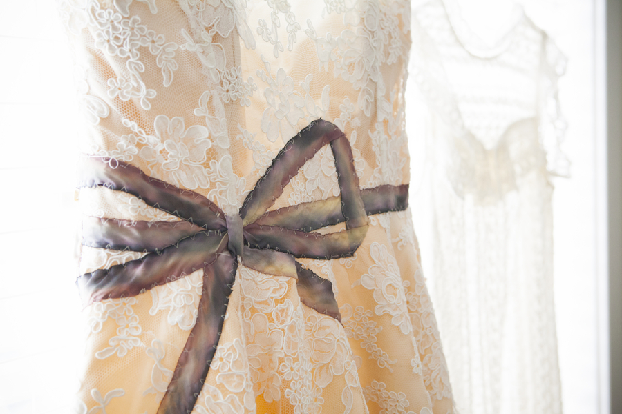 DIY Barn Wedding - the brides beautiful wedding dress, the detail / photo by Town Country Studios / as seen in the vendor guide on www.Brendasweddingblog.com