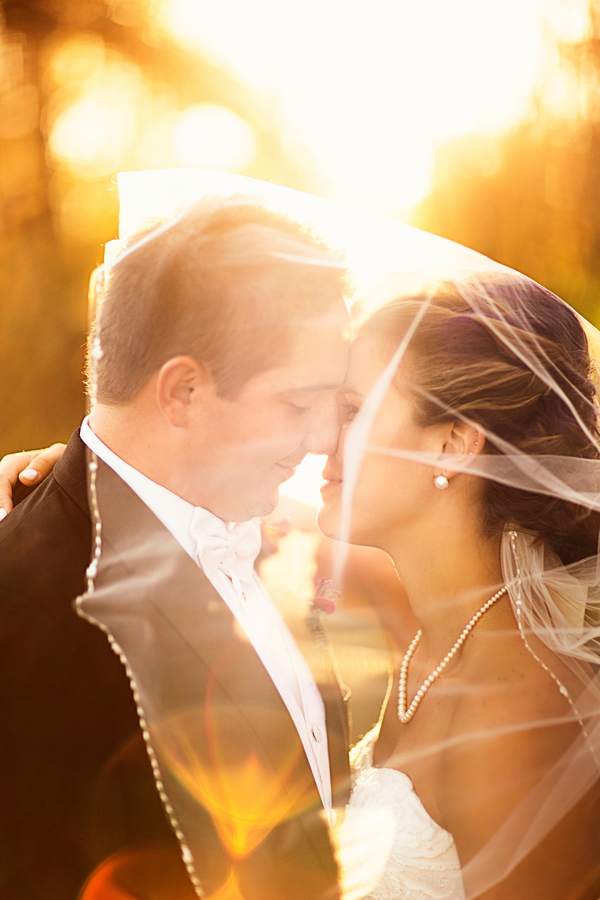  Spectacular Lighting in this Bride and Groom Portrait from their Fall Wedding / photo by Morgan Lindsay Photography / as seen on www.BrendasWeddingBlog.com 