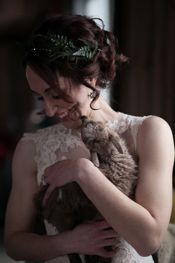  Bride being kissed by a baby goat / photo by Corey Lynn Tucker Photography / as seen on www.BrendasWeddingBlog.com 