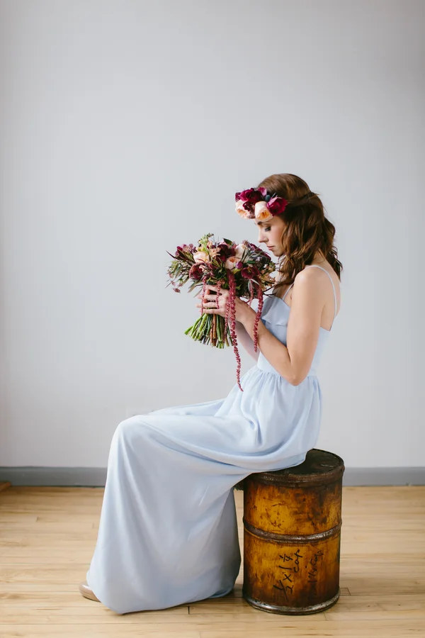 Pretty contrast between pale blue bridesmaids dress and deep burgundy bouquet / by Wallflower Designs / photo by Maggie Fortson Photography