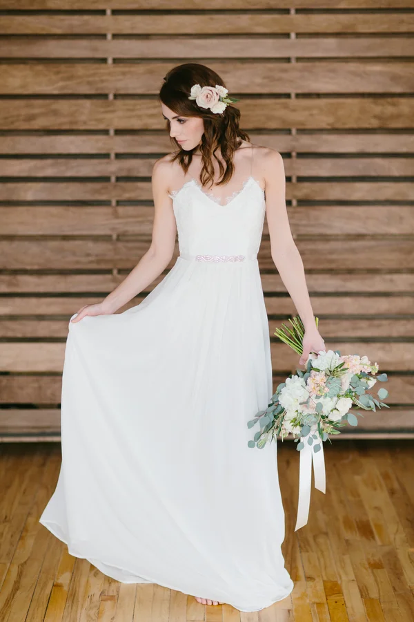Delicate and Romantic Handmade Wedding Gown by Cettina with a classic silhouette / photo by Maggie Fortson Photography