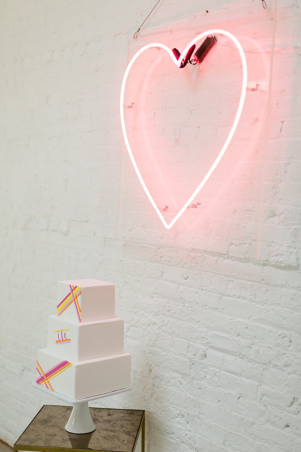 Modern Neon Wedding Cake / designed by Ashley Peraino + Ivey Weddings & Events / Cake by Erica O'Brien Cake Design / photo by Jessica Haley Photography