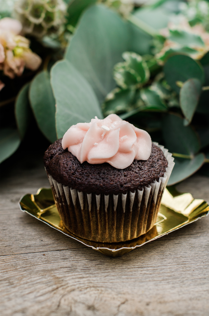  Simple Frosting atop a cupcake presented on a mini gold plate — Click to see 8 DIY Wedding Ideas for a Springtime Bridal Shower Brunch — Part of the 37 Creative DIY Wedding Ideas for Spring as seen on www.BrendasWeddingBlog.com 