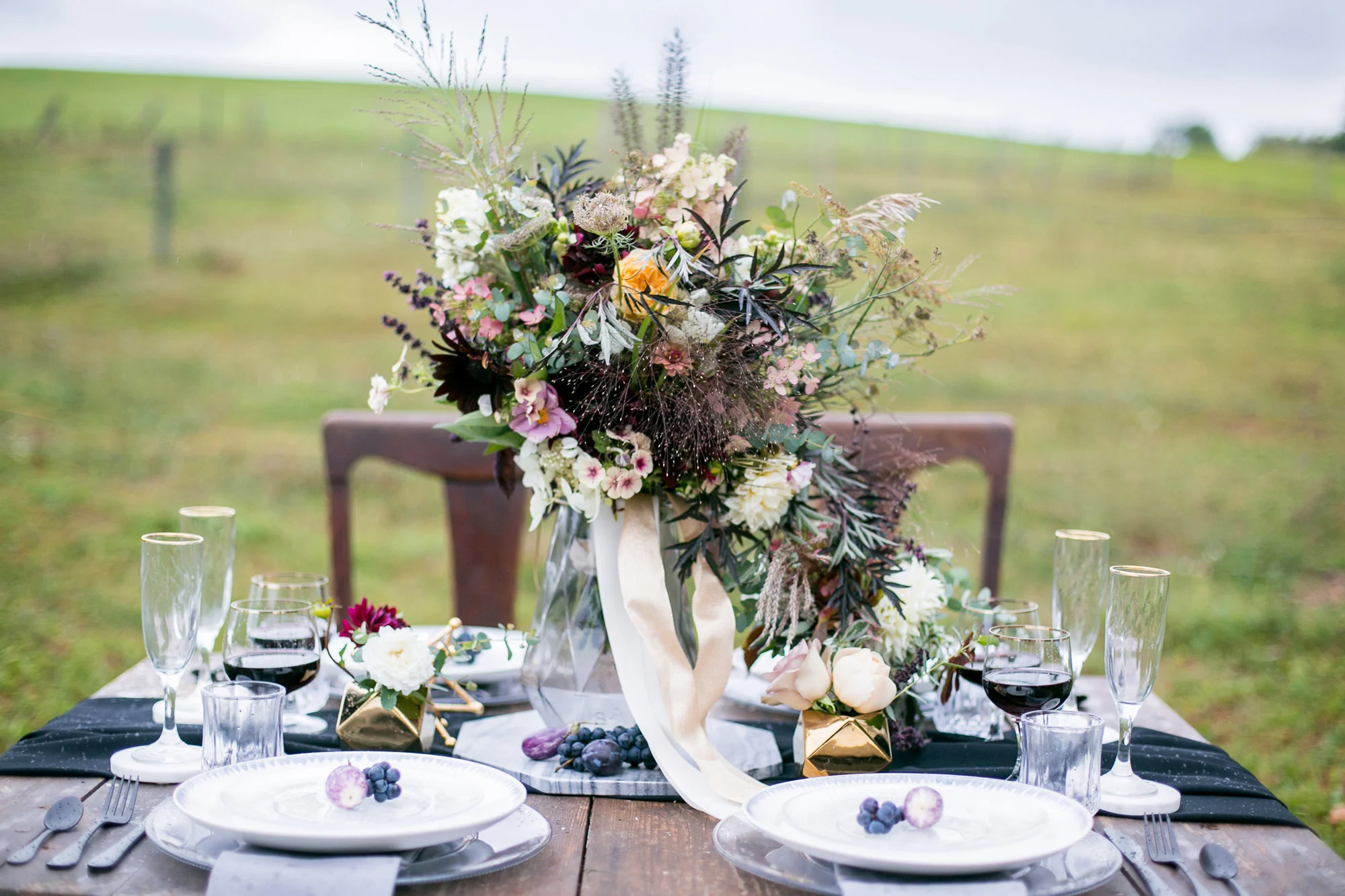 Moody and Dramatic Wedding Ideas and Inspiration for an outdoor wedding tablescape - photo by Chantal Routhier Photography — click to see more inspiration on www.BrendasWeddingBlog.com