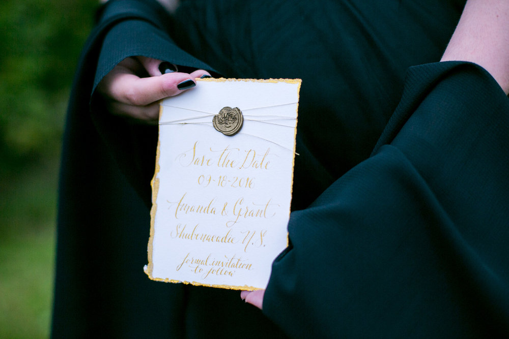  Gold Edged Save the Date with a Wax Seal — Moody and Dramatic Wedding Ideas + Inspiration —&nbsp;photo by Chantal Routhier Photography — click to see more inspiration on www.BrendasWeddingBlog.com 