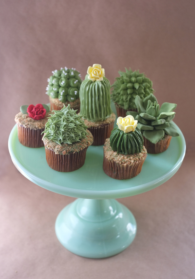  Present cupcakes at your next desert themed dessert party with frosting in the shape of cactus. As seen in Cactus Wedding Ideas - a hot wedding trend on www.BrendasWeddingBlog.com 