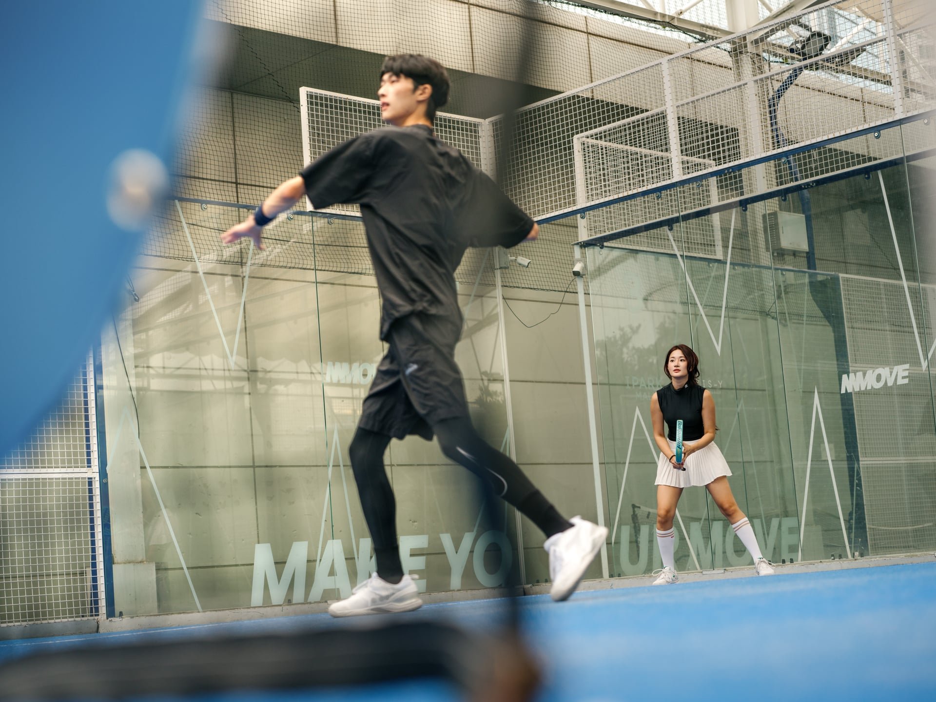Commercial padel photography Seoul — doubles court action shot Korea