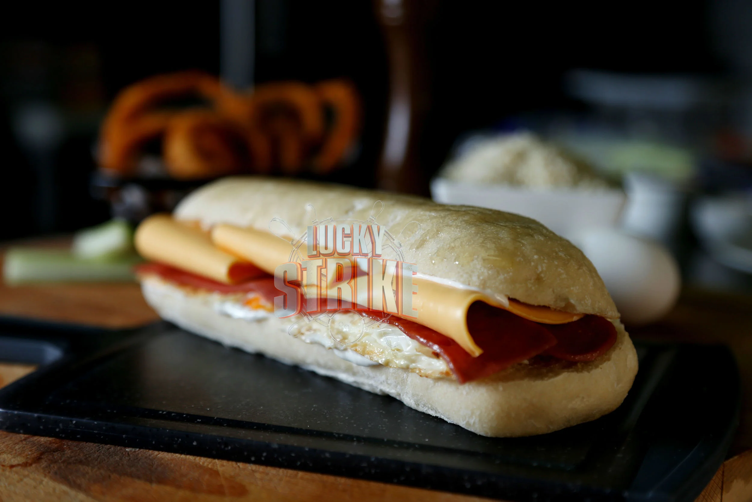 BREAKFAST PANINI 25 Grilled ciabatta bread sandwiched with egg, bacon, swiss cheese & mayo 