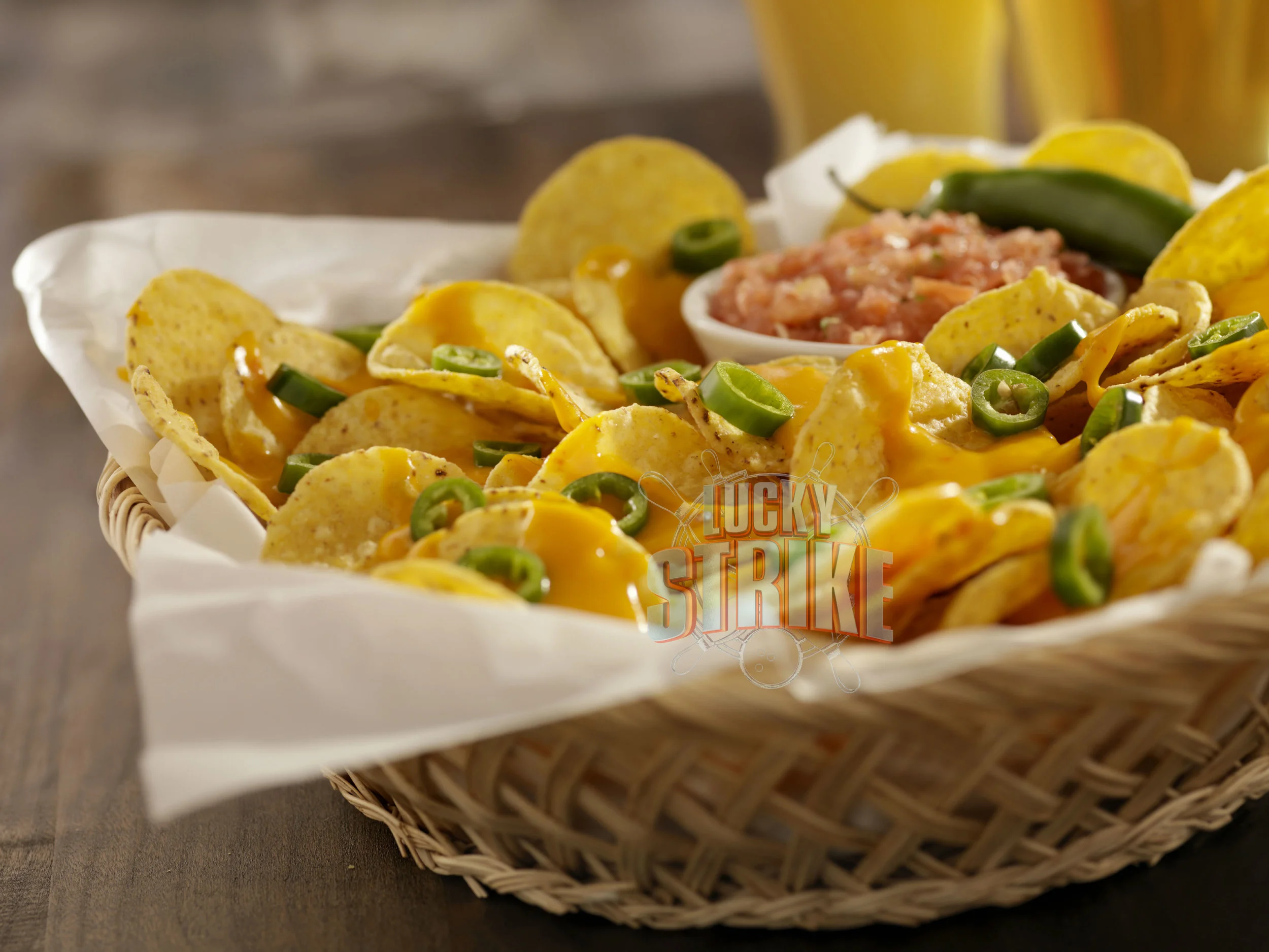 NACHOS 20 The way they should be: piled high with melted cheese, jalapenos, sour cream and salsa fresco