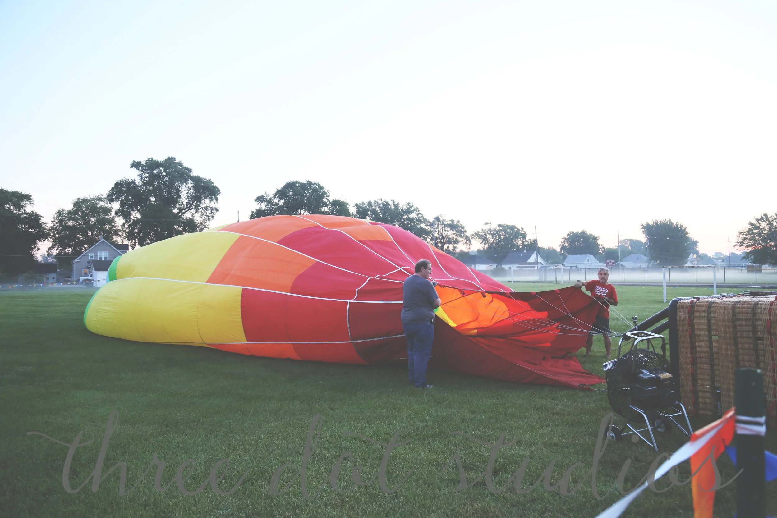 In order to actually blow the enormous thing up, they have 2 gas-powered industrial fans to start filling it with air. 