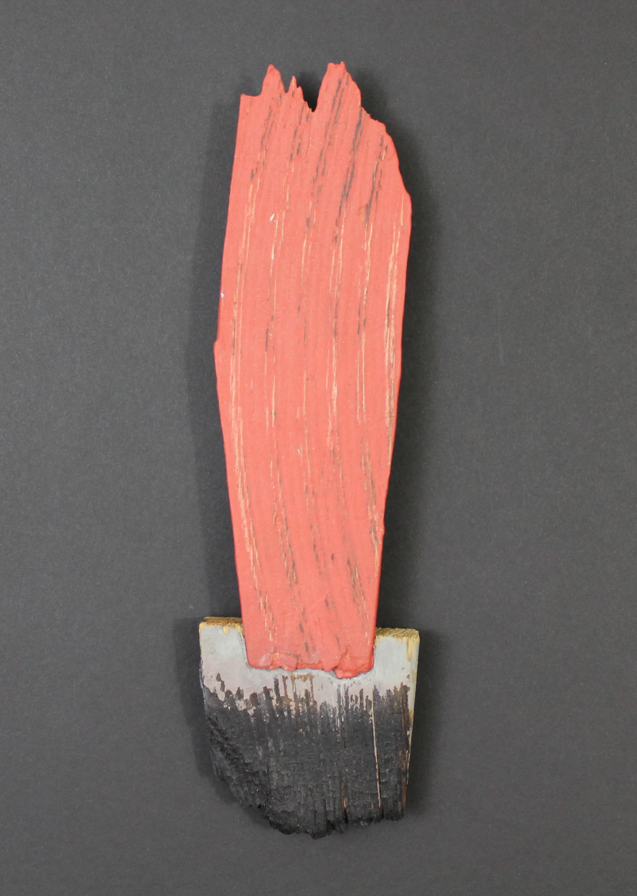  ​ ioi flame , 2012  



 mixed media on wood, found wood 

 3.5 x 13 x 1 inches 

 