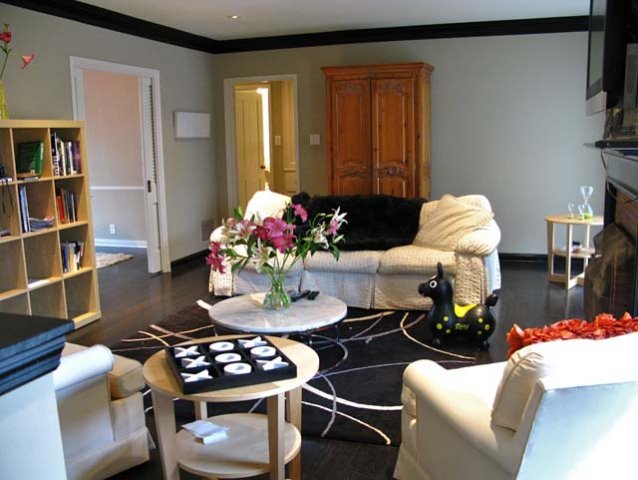 View from top of entry stairs toward living room