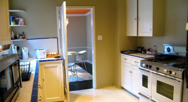 Kitchen view toward formal dining room