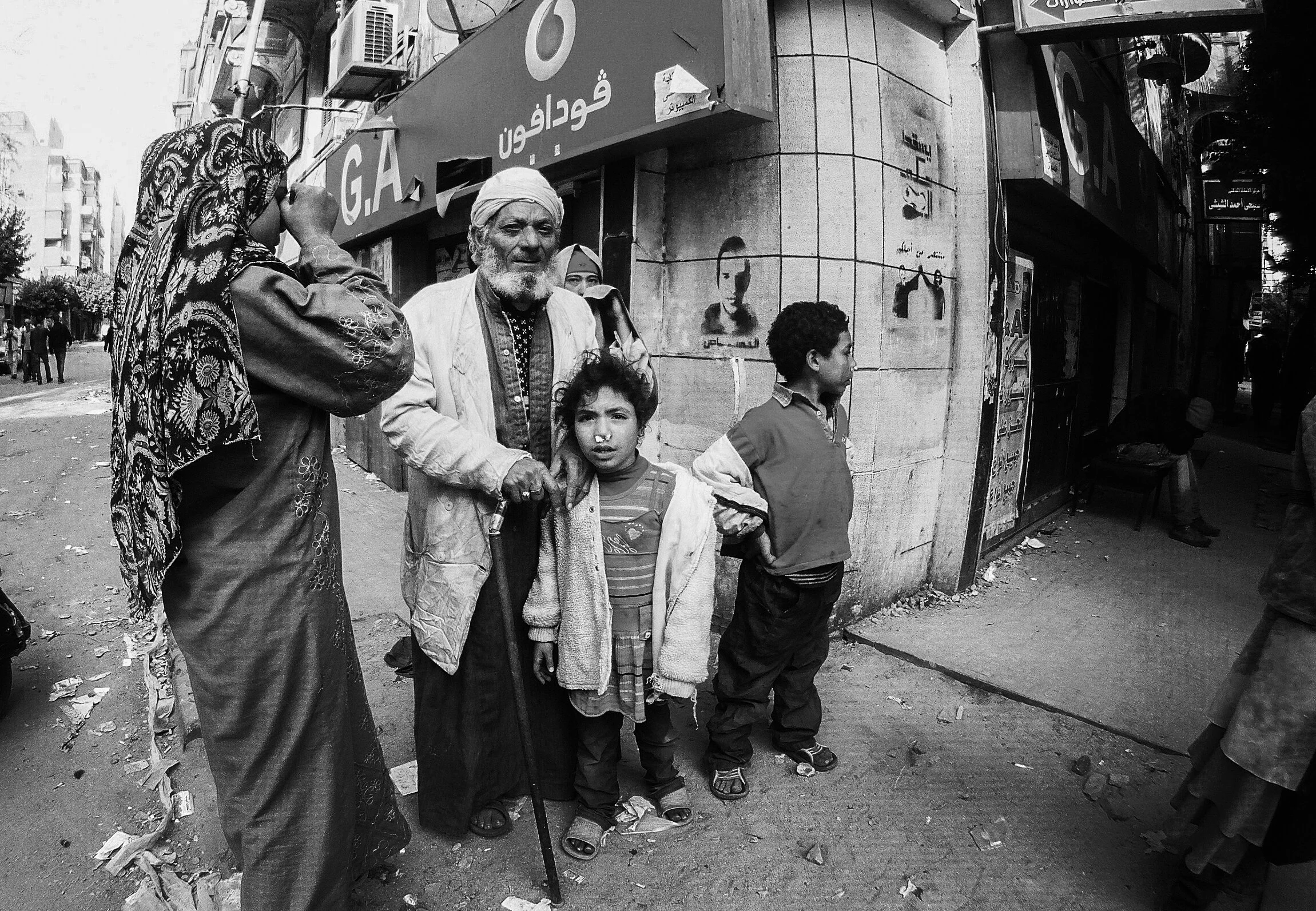 Kids with Noseplugs Tahrir Cropped BW.jpg