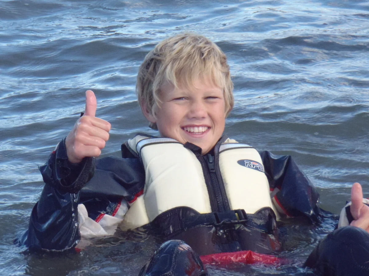 kid in water thumbs up.jpg