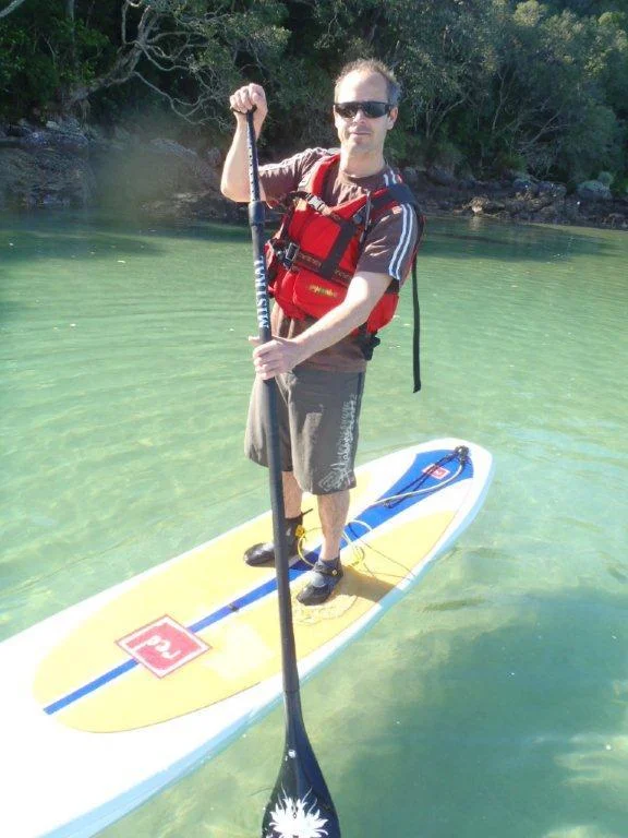 pete paddleboarding on whanga harbour.jpg