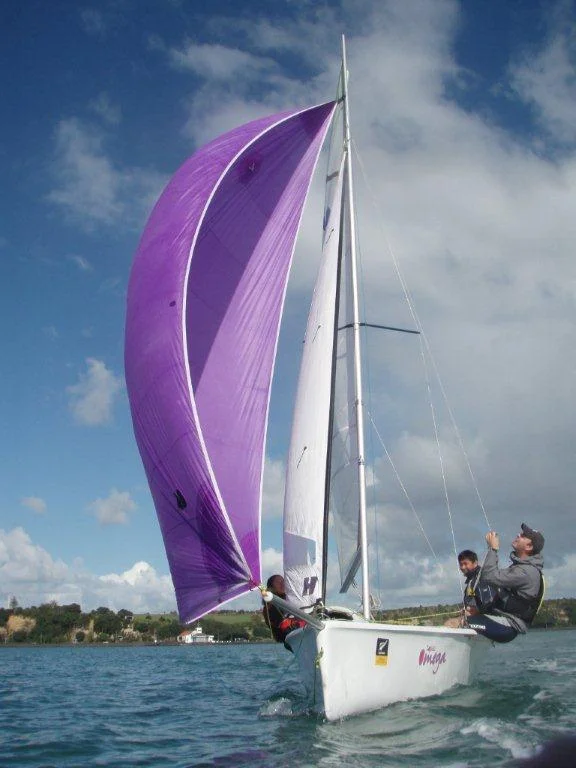 Omega under sail with spinnaker.jpg