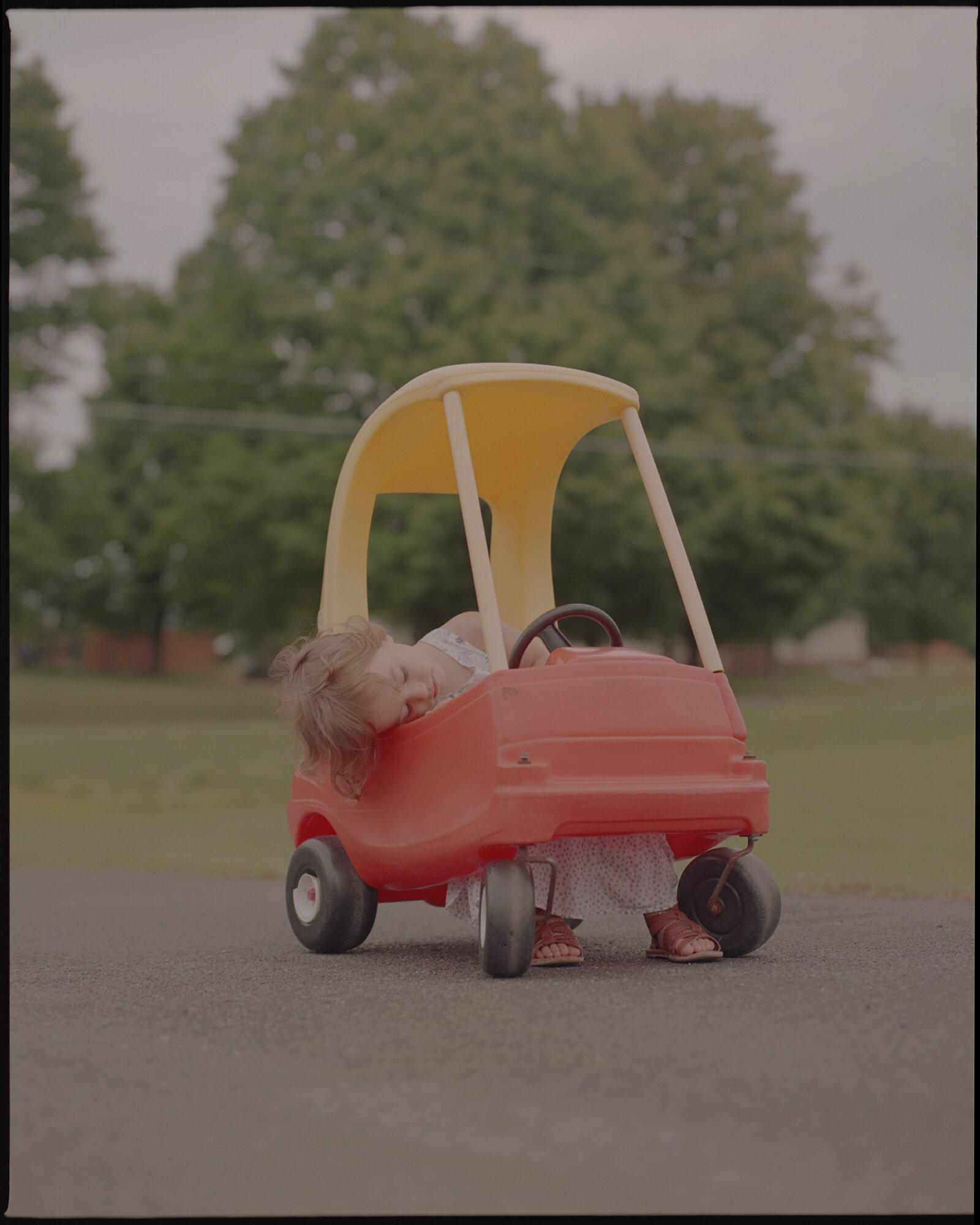 Laura in her Red Car