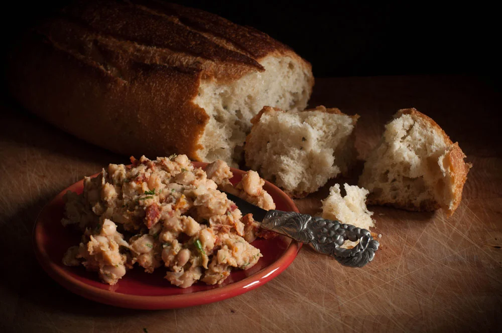 food photography sundried tomato bean spread bread