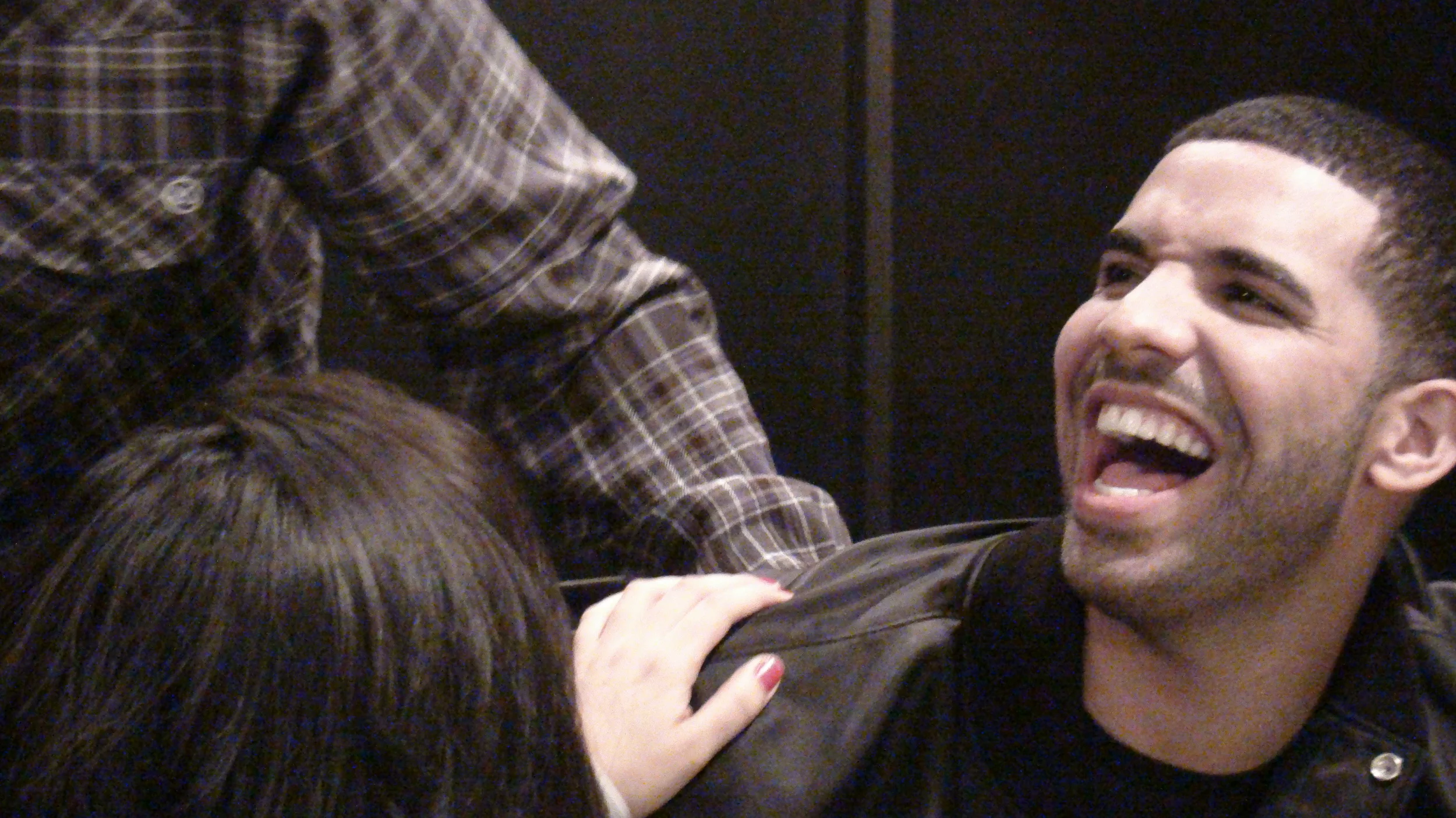 Drake cracks up..