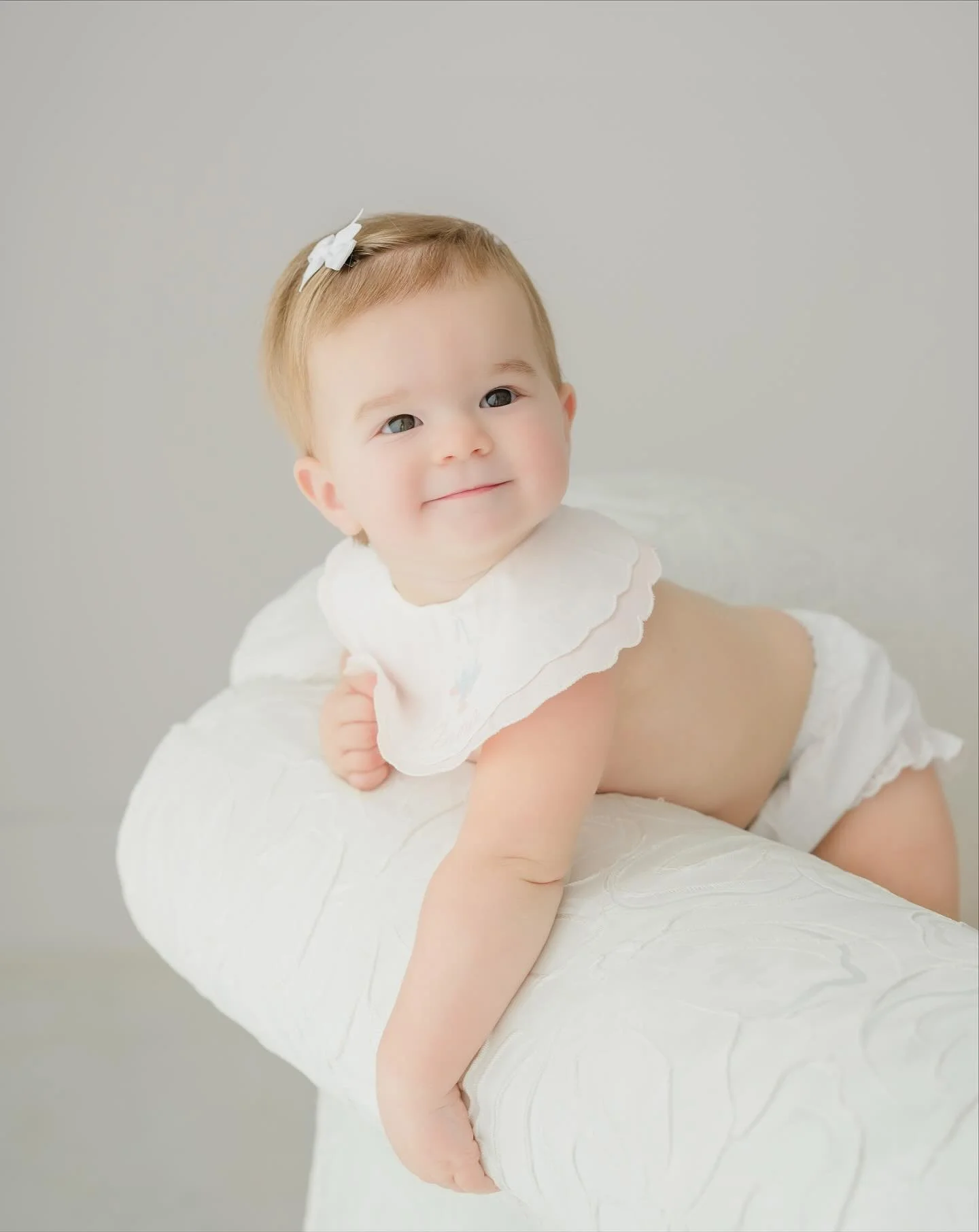 The first photo I think is so DANG CUTE, may be one of my favorites! I love her little expression and the way she is posed over the coach. That last one though, is a really close 2nd!!They are all so sweet! Baton rouge baby photographer, Baton Rouge 