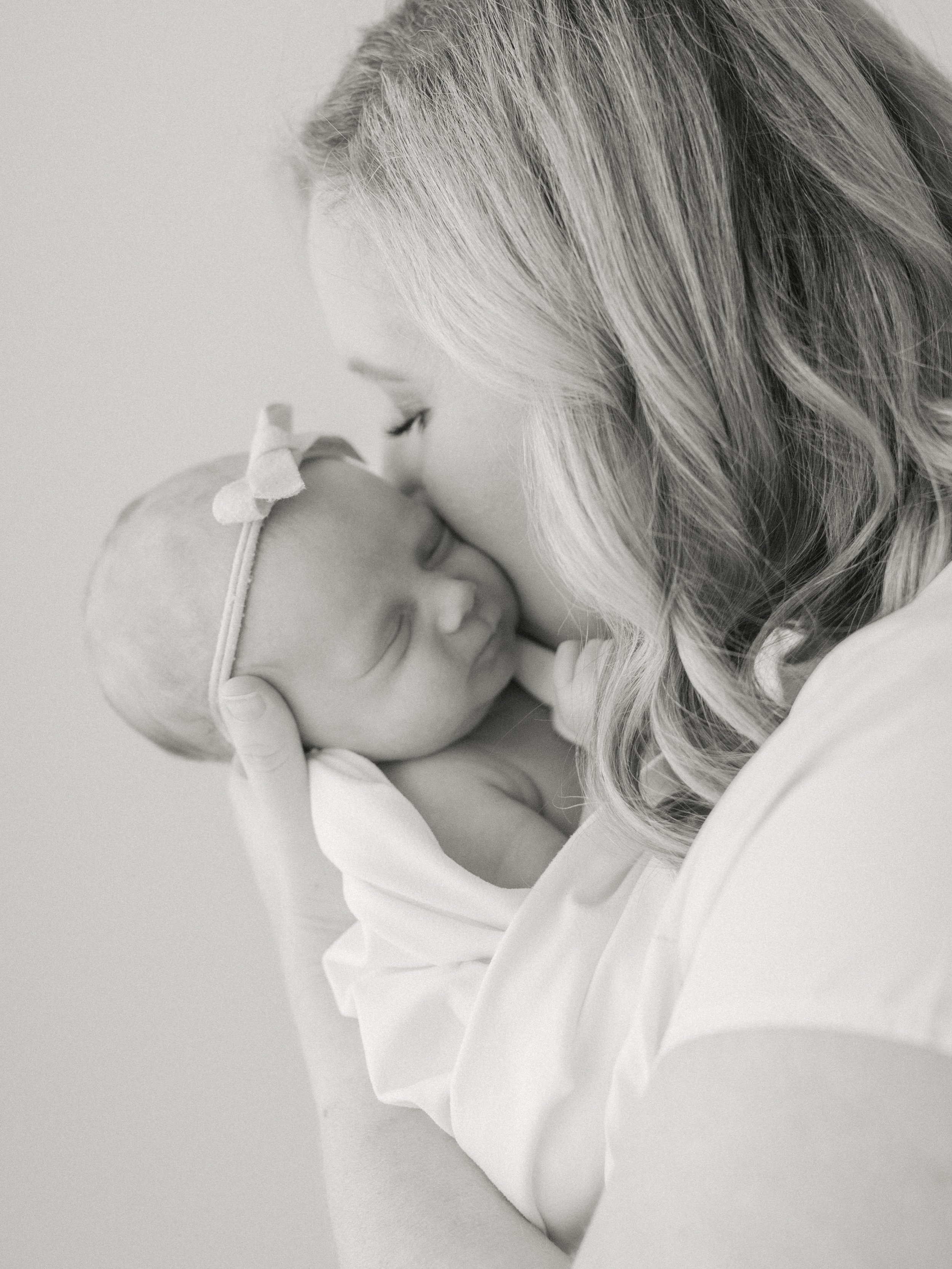 A beautiful little girl joined this sweet family and her siblings were obsessed with her! It was so precious. Want a newborn shoot but keep a busy schedule? Come in early for your session and then everyone can get to school and work in no time! Baton