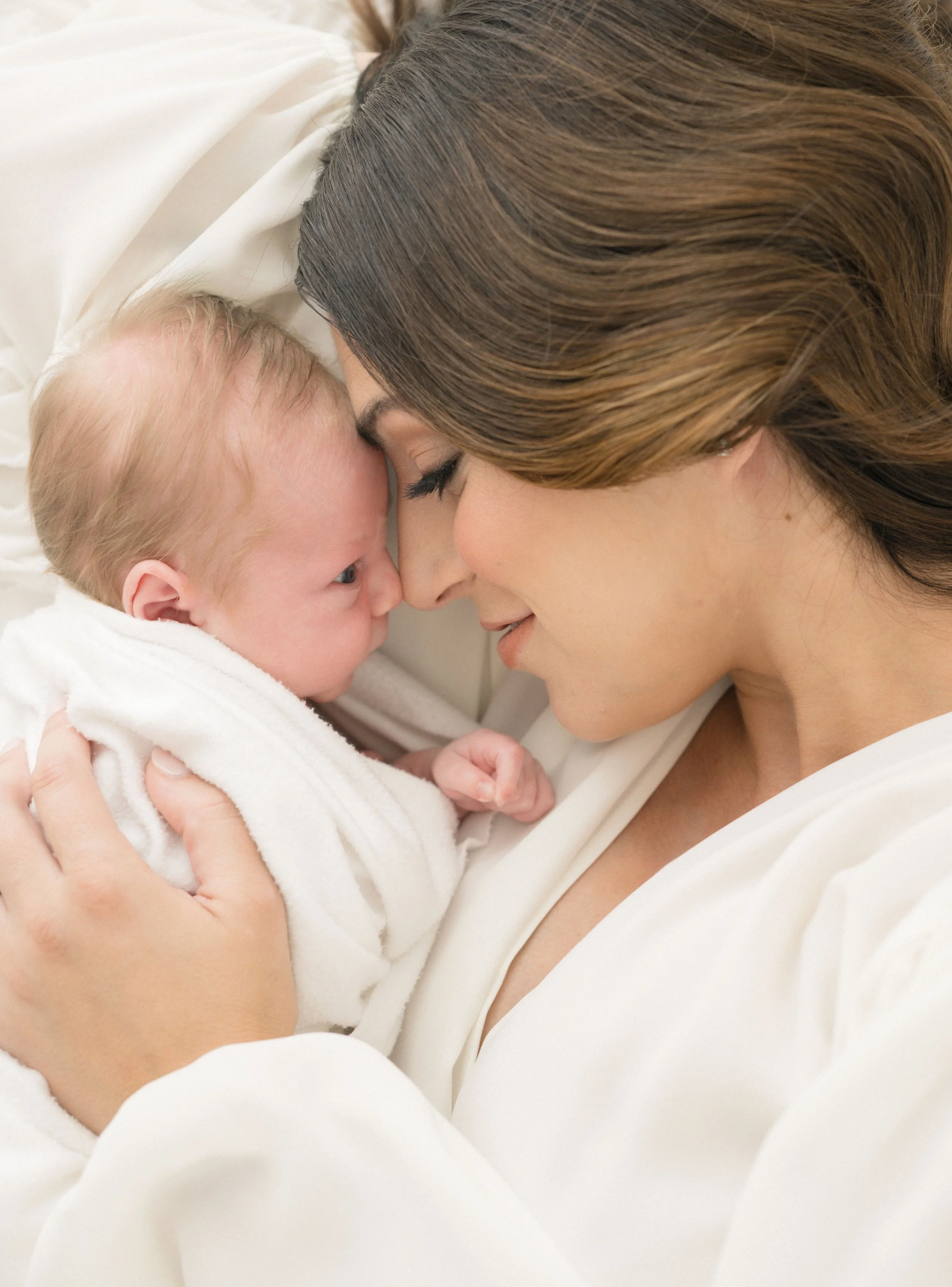 Natural light newborn portrait, elegant and timeless, season off motherhood captured sweetly.