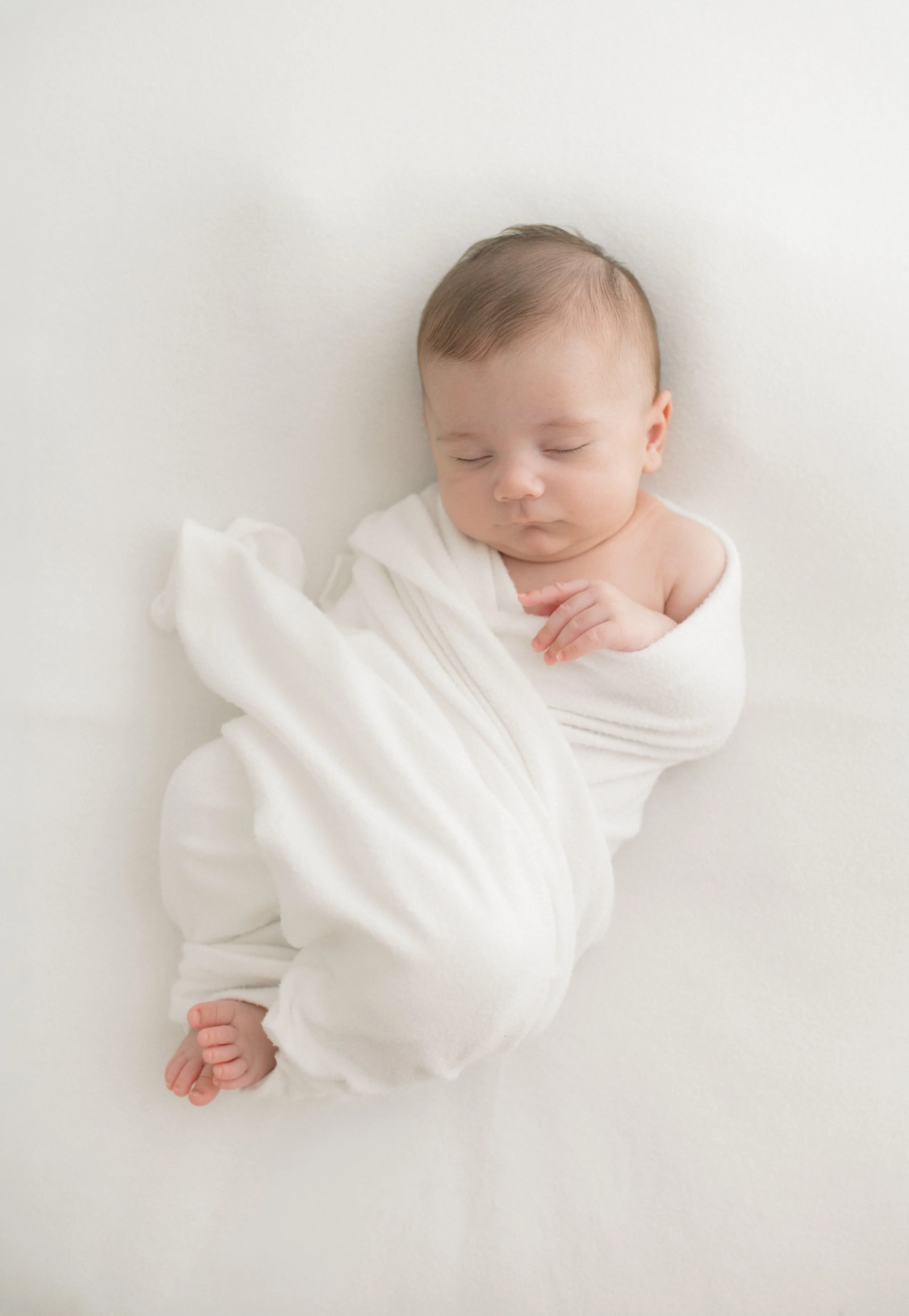 Natural light newborn portrait, elegant and timeless. 