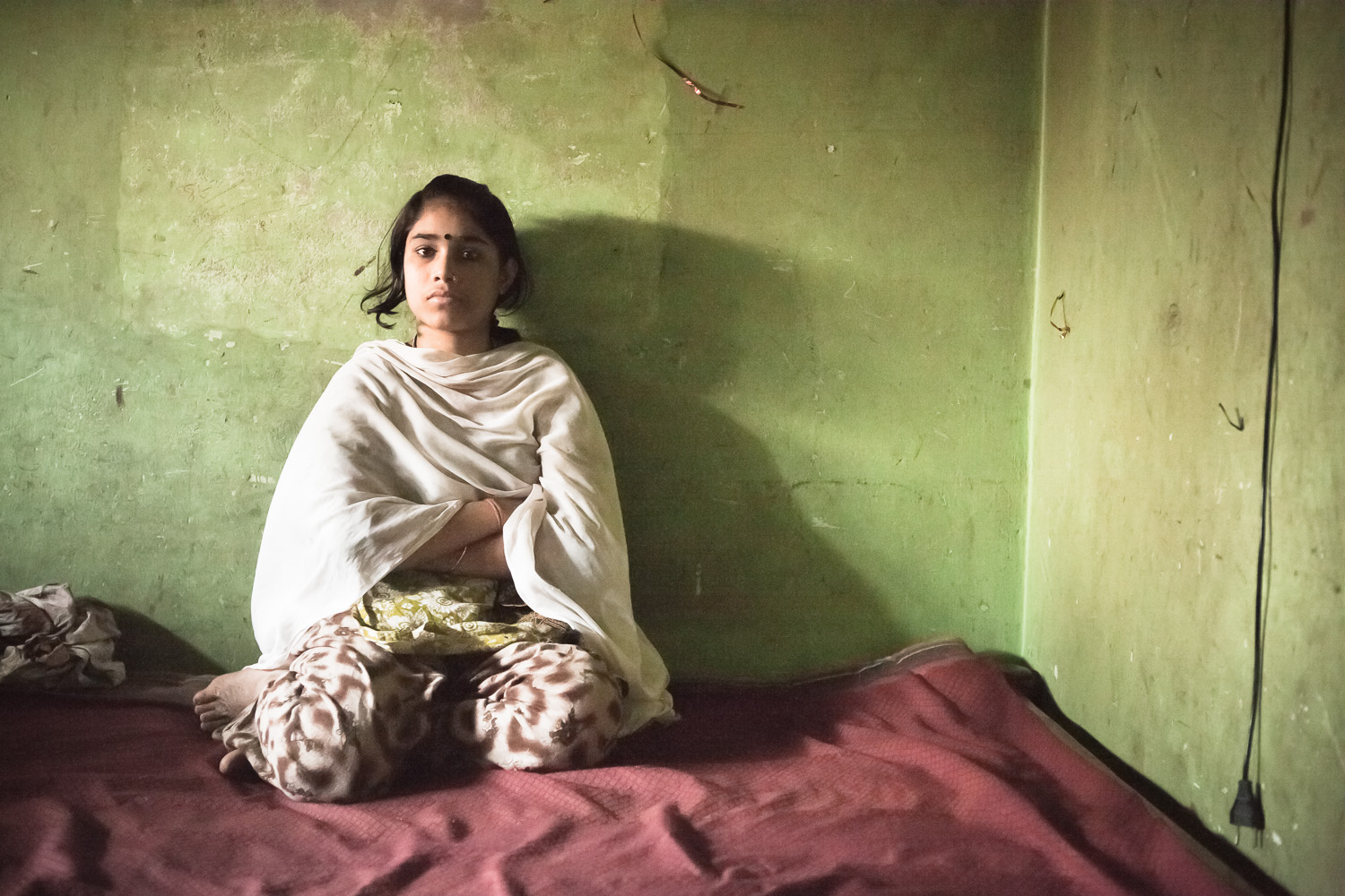  Dhaka, Bangladesh, Geneva Camp. Rina, 14, was married when she was 13. She had to move into Geneva Camp to her husband's family, where she doesn't know anyone. She has been living in Geneva Camp for three months, but she is not a Bihari and she does