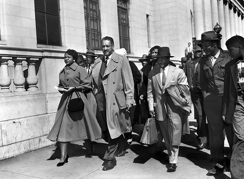 Autherine Lucy (left) with Thurgood Marshall (center) and Birmingham attorney Arthur Shores. After the Montgomery bus boycotts and Lucy being the first African American admitted to the University of Alabama, the Alabama Attorney General attempted to oust the NAACP from the state in part because it allegedly did not comply with state law for out of state corporations.