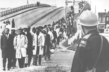 This photograph was taken on March 7, 1965. Approximately 60-70 Alabama state troopers and others met approximately 650 African Americans as they crossed the Edmund Pettus Bridge in a march from Selma to Montgomery, Alabama.