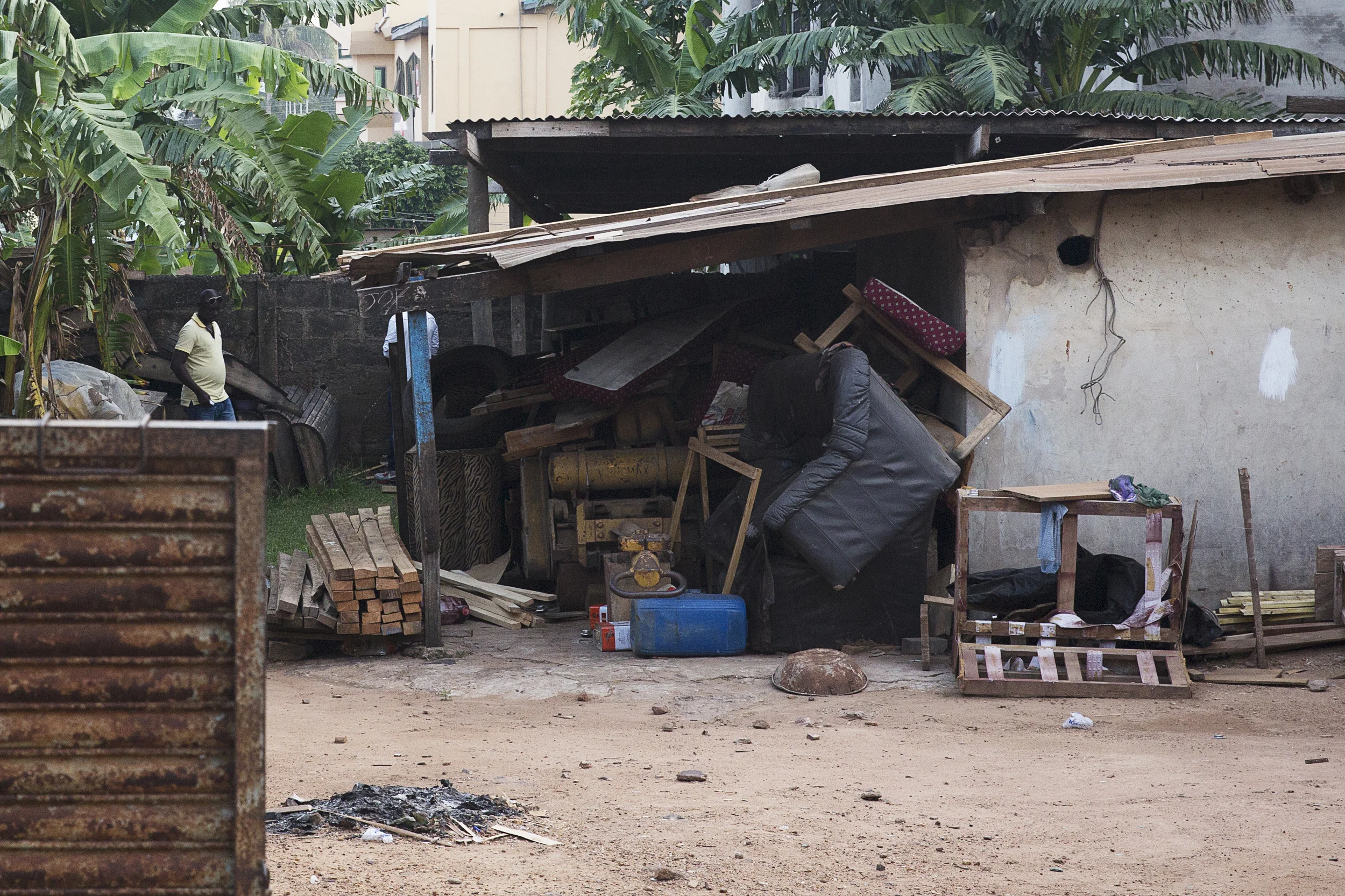 A poor home directly across from the extremely luxurious mall.