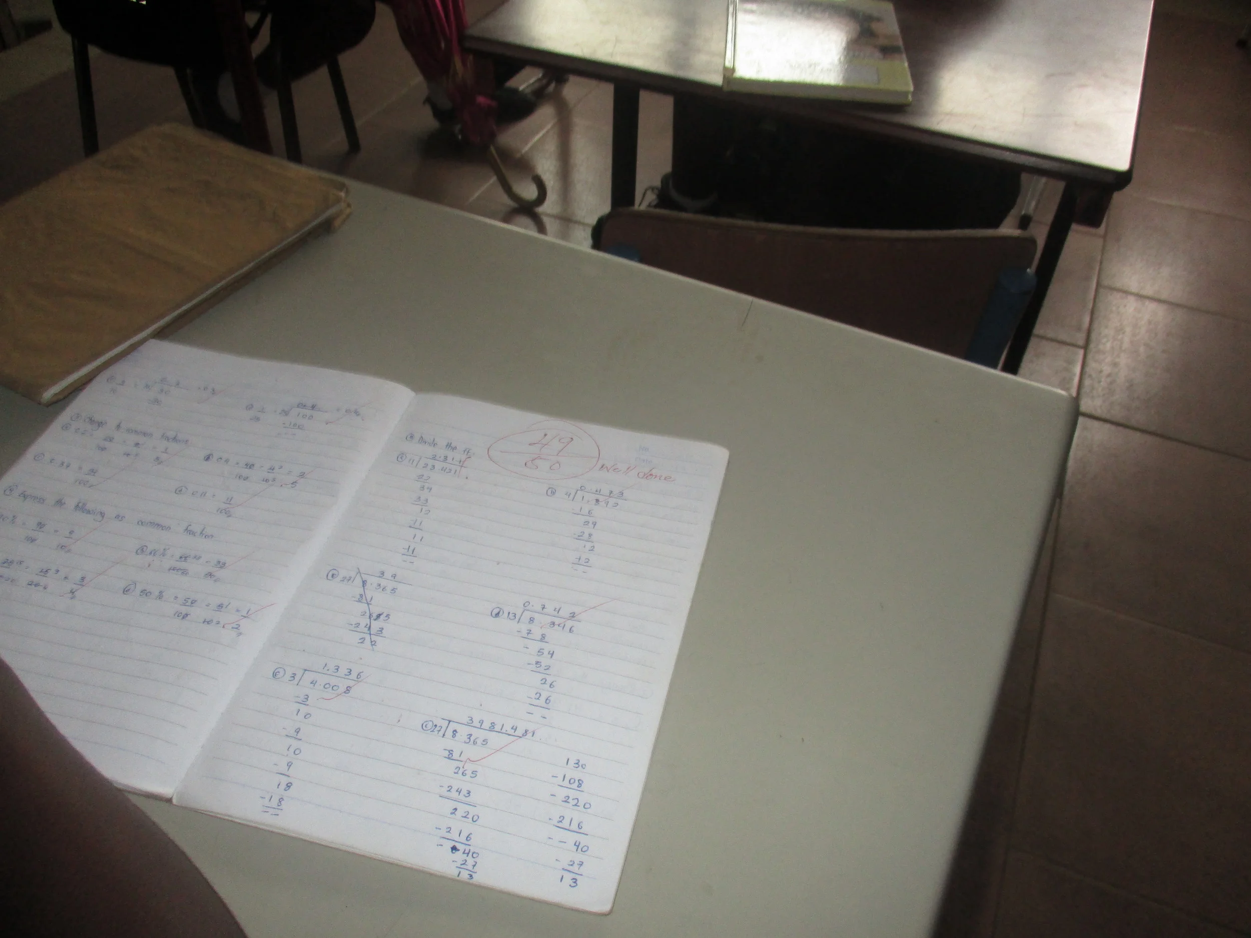 A homework notebook photographed by Princess (Class 5).