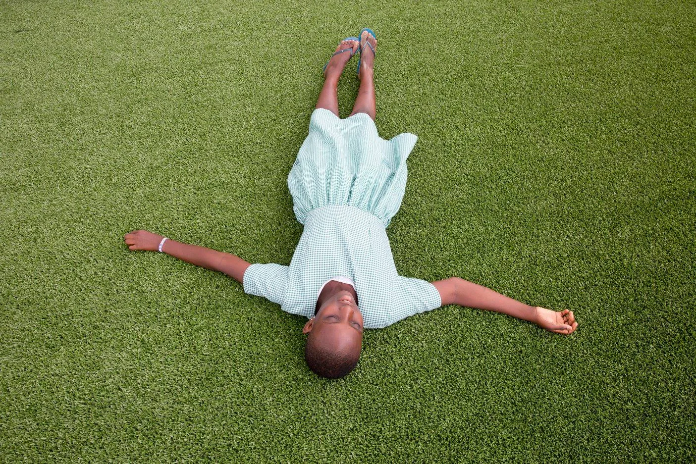 My new roommate Cindy laying on the astro-turf. 