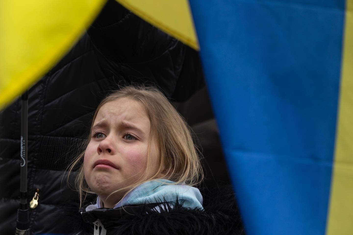  Bozhena Denisova, 9, cries as she marches against Russia’s invasion of Ukraine during a rally in Philadelphia, Pennsylvania on March 27, 2022. (On assignment for Reuters) 