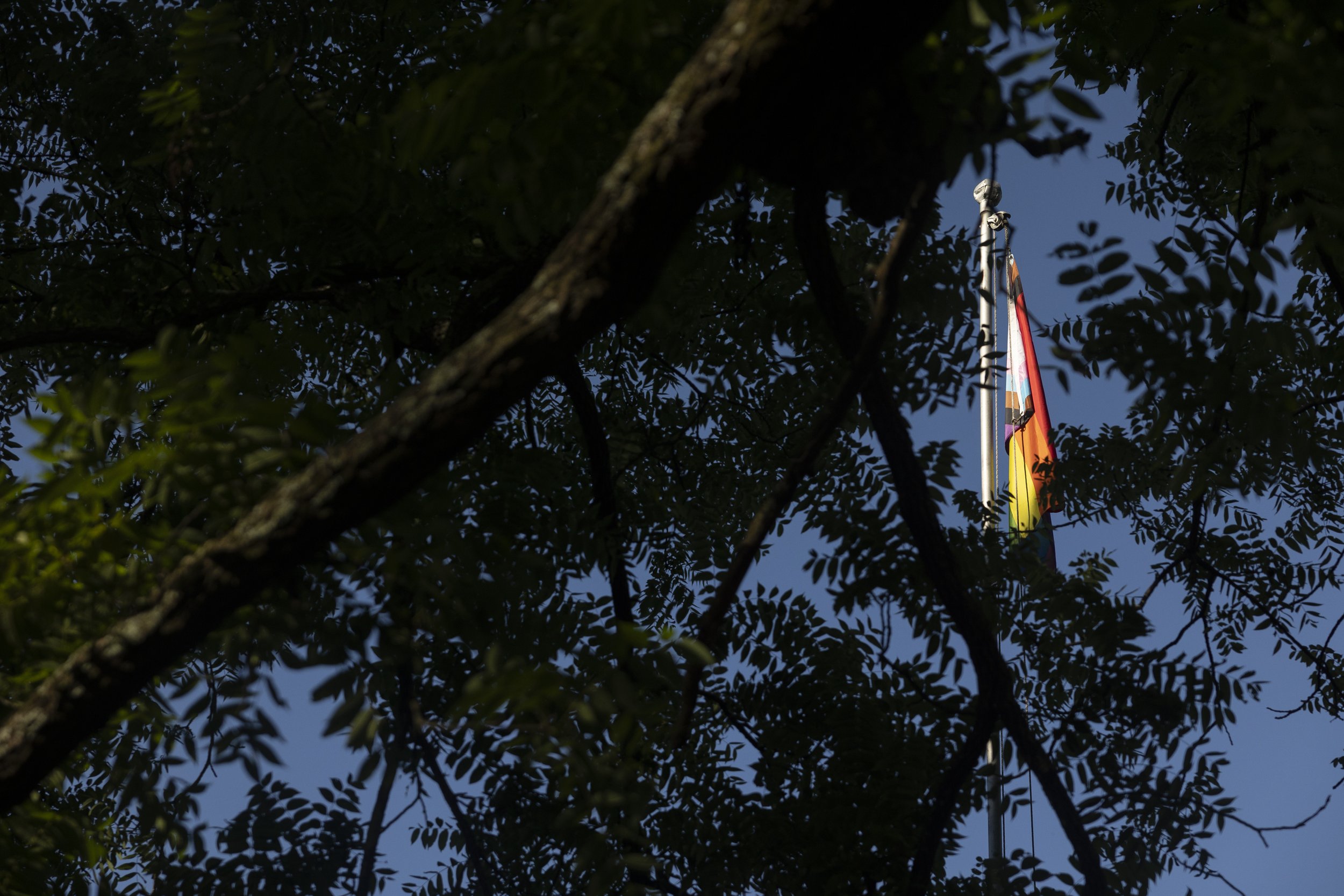  The gay pride flag flies on the last day of Camp Indigo Point on June 18, 2022. 