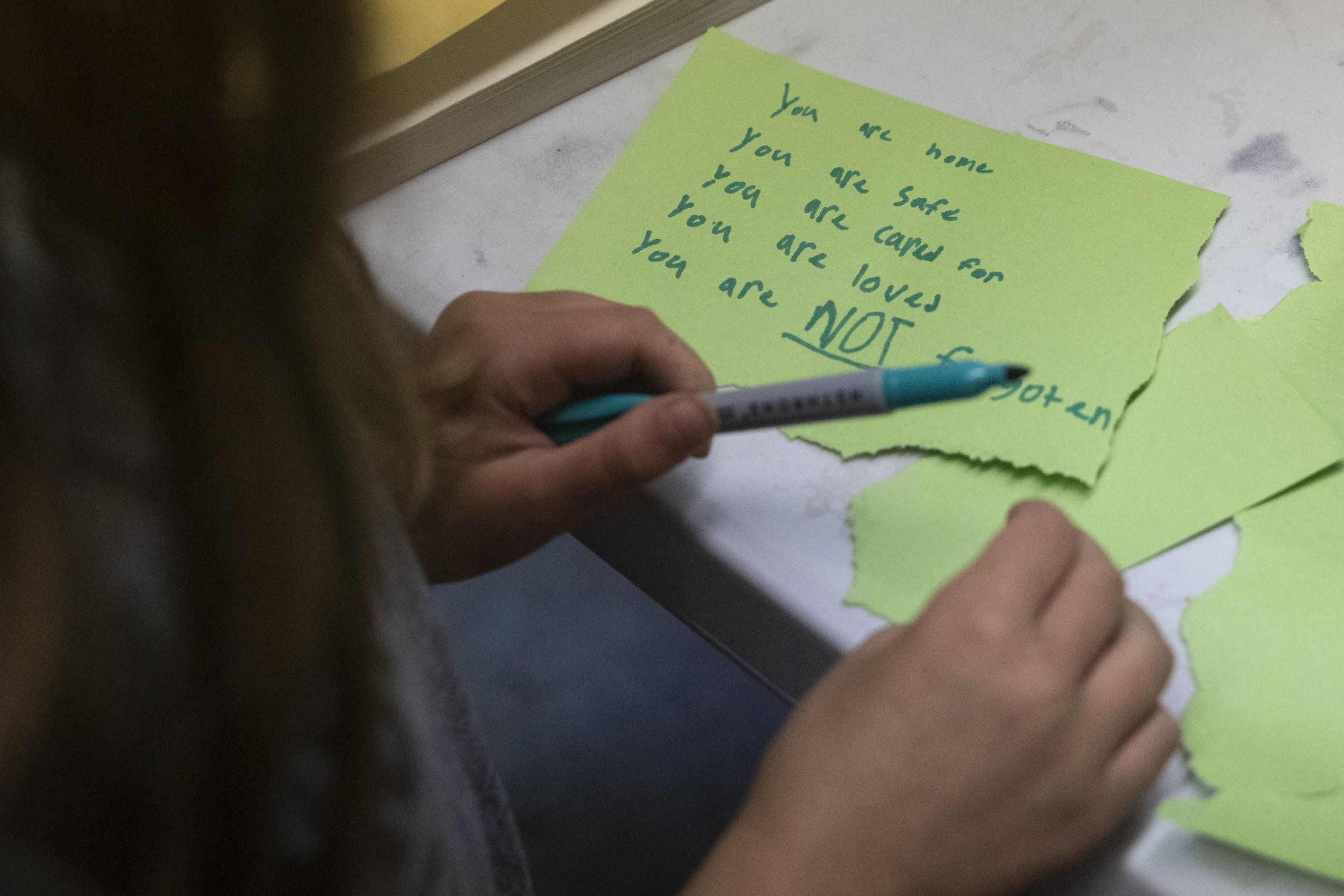  Eloise (she/her) writes a letter to herself on the last day of camp. The letter reads: “You are home, You are safe, You are cared for, You are loved, You are NOT forgotten.”  