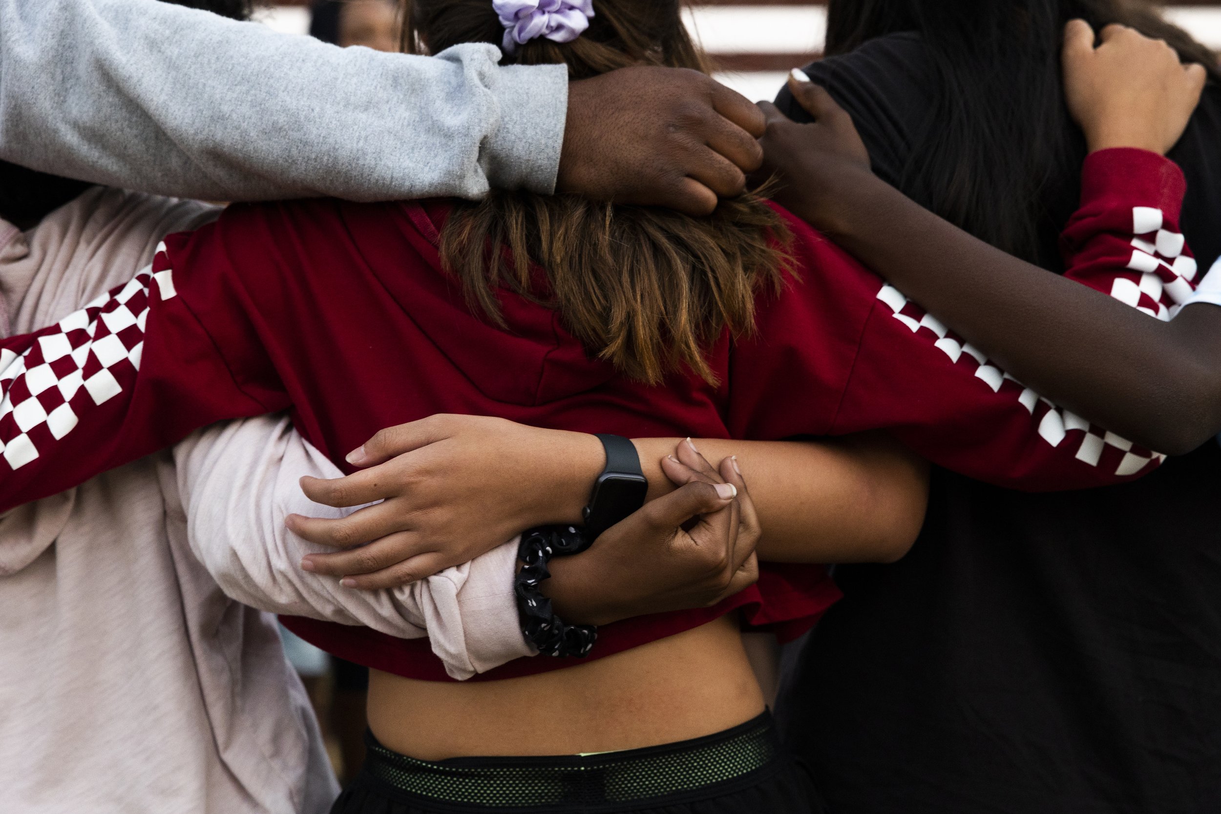  Campers and counselors link arms during Hashkiveinu, the daily goodnight prayer, at Camp Bechol Lashon in Santa Rosa, California on August 7, 2021. (On assignment for NPR) 