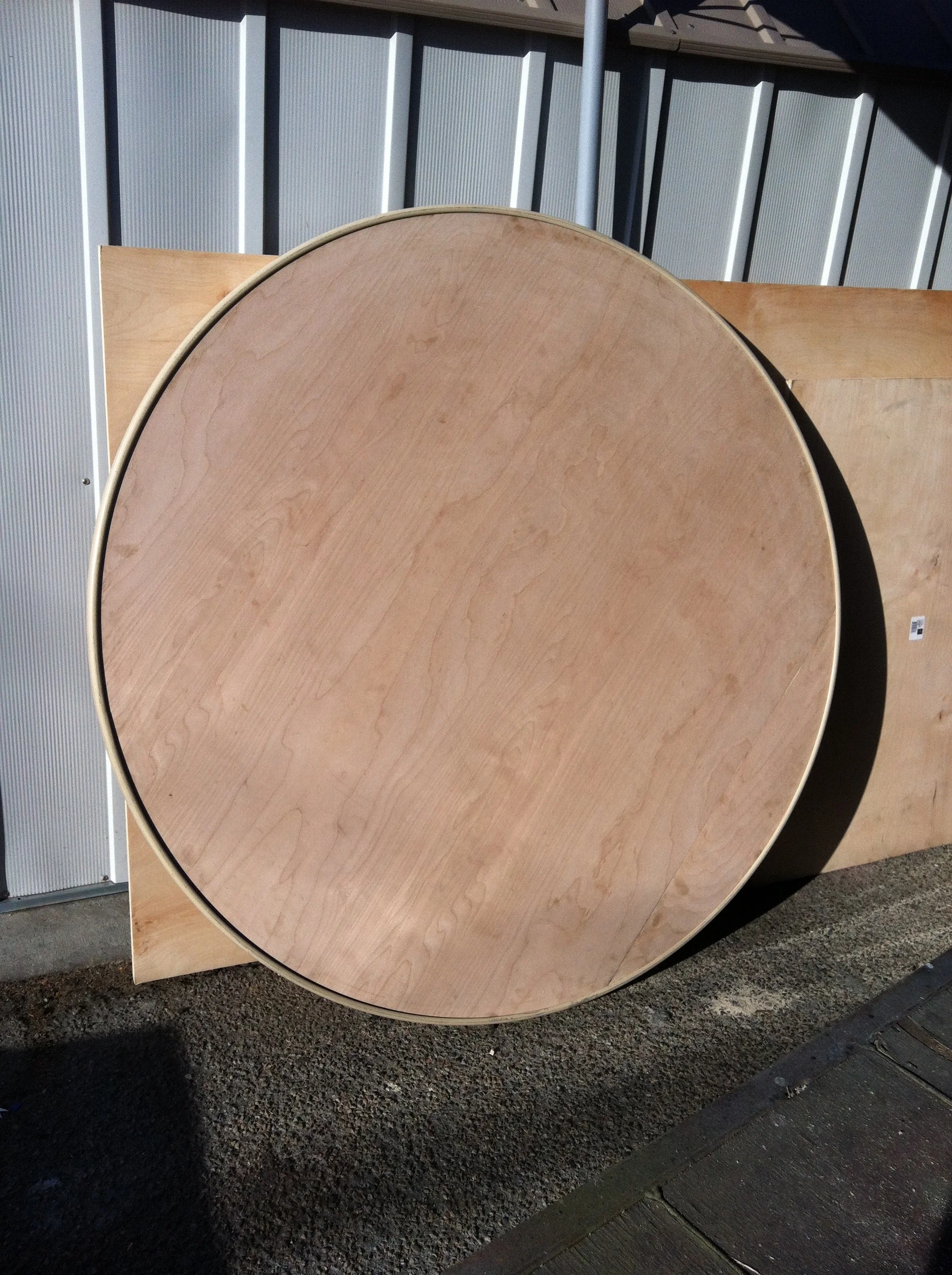 replaced glass top with plywood insert for in store clothing display 