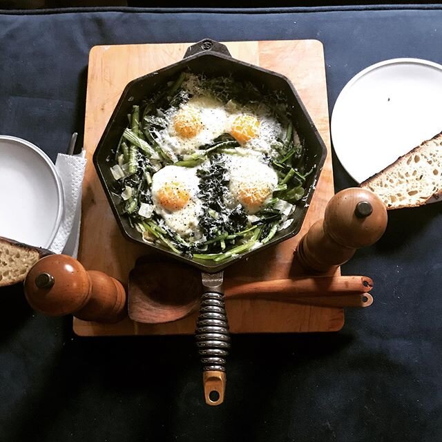 Expanding horizons.  Dandelion greens, onion, eggs and hard cheese.  We have to improvise with what we have.  #comesicantacomesicuoca