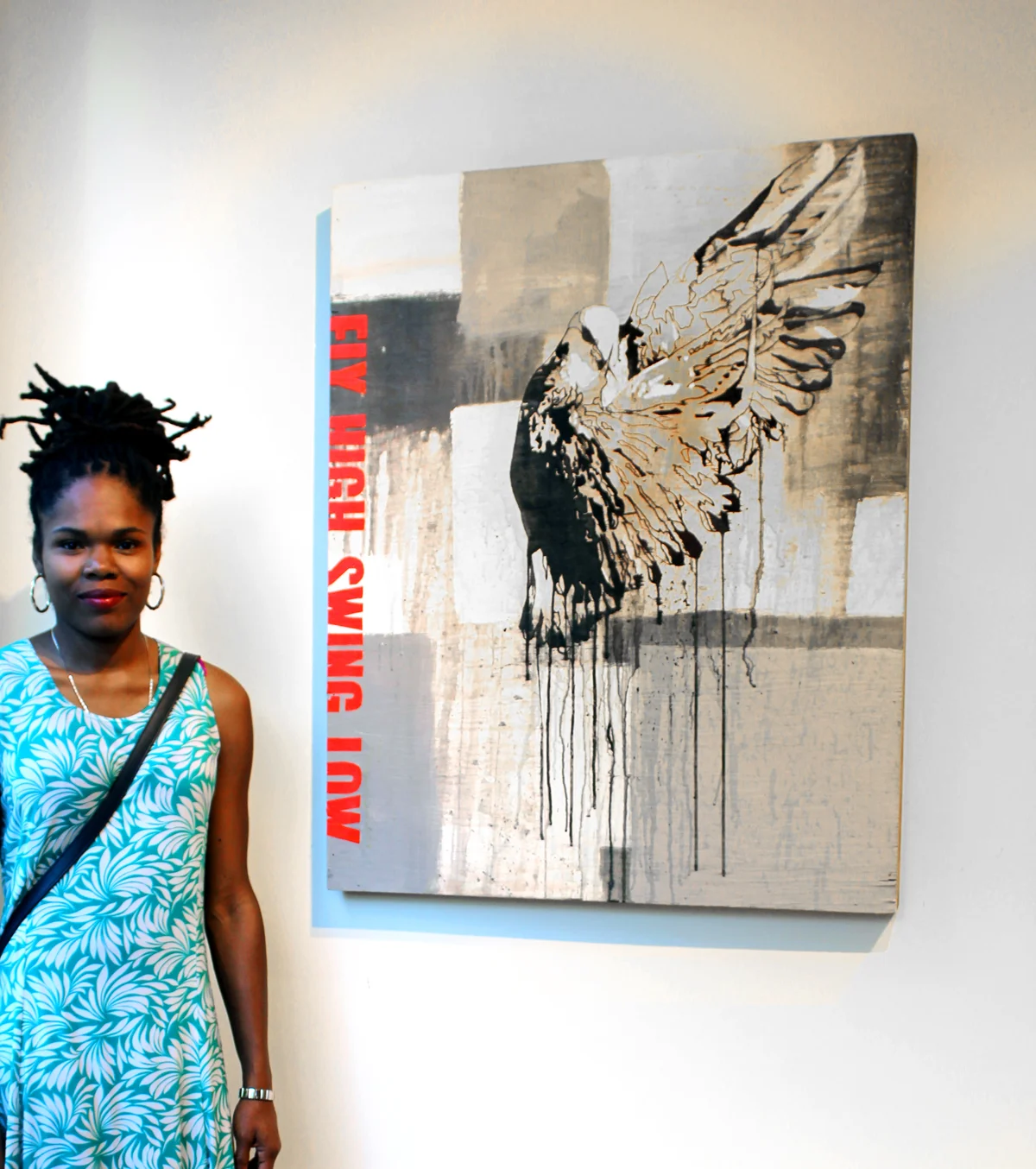 jenevieve with art piece.jpeg