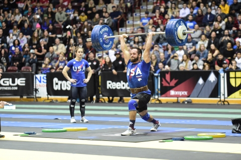 Rich Froning sticking his Clean and Jerk opened at 355lbs. Nikon D4s, Sigma 120-300, 1/640th, F2.8, ISO 6400, Copyright CrossFit, Inc 2016