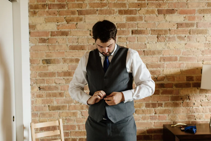 004-groom-getting-ready-in-naperville.jpg
