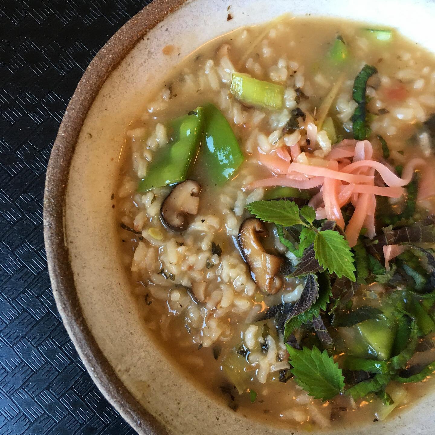 What do I eat when I am not baking #glutenfree? I love a #vegan #riceporrige. Also known as #jook or #congee. It is a staple at my house. This one I made with #shitakes #mushroomstock #snowpeas #shiso #bokchoy #pickledginger. This is food that warms 