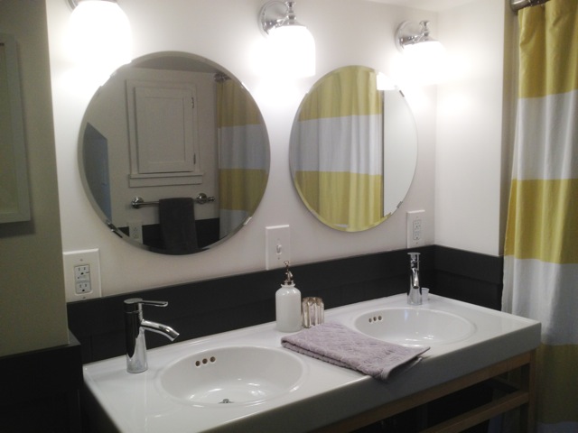  Double sinks, faucets, and mirrors are from IKEA (MOLGER). The lights are from Pottery Barn. 