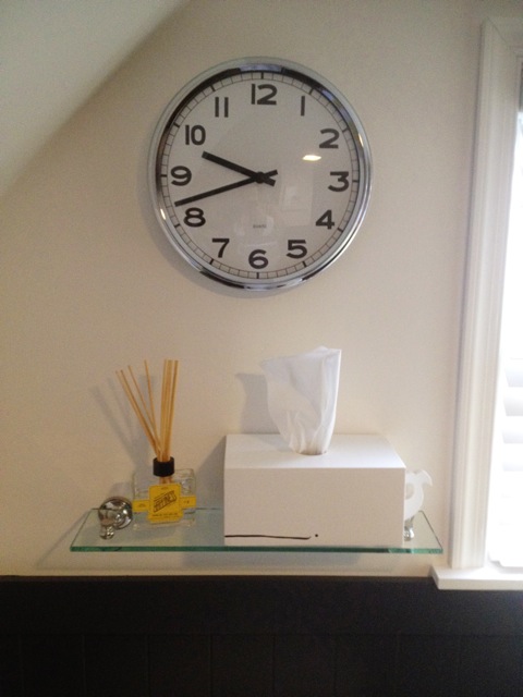  ​whale tissue holder from Etsy, clock from IKEA, shelf from Lowe's 
