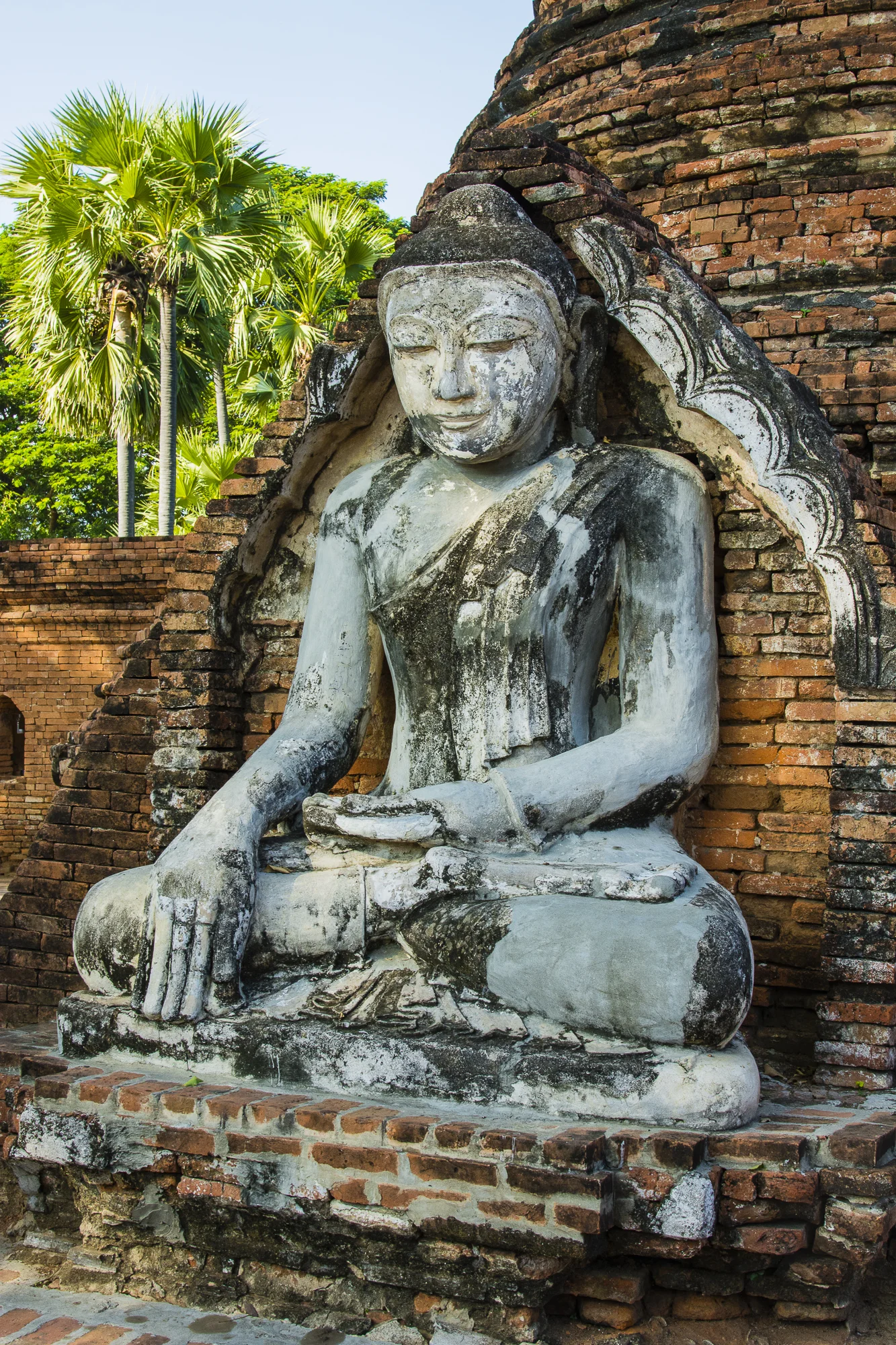 Buddha in the ancient capital of Inwa, Mandalay, Myanmar.