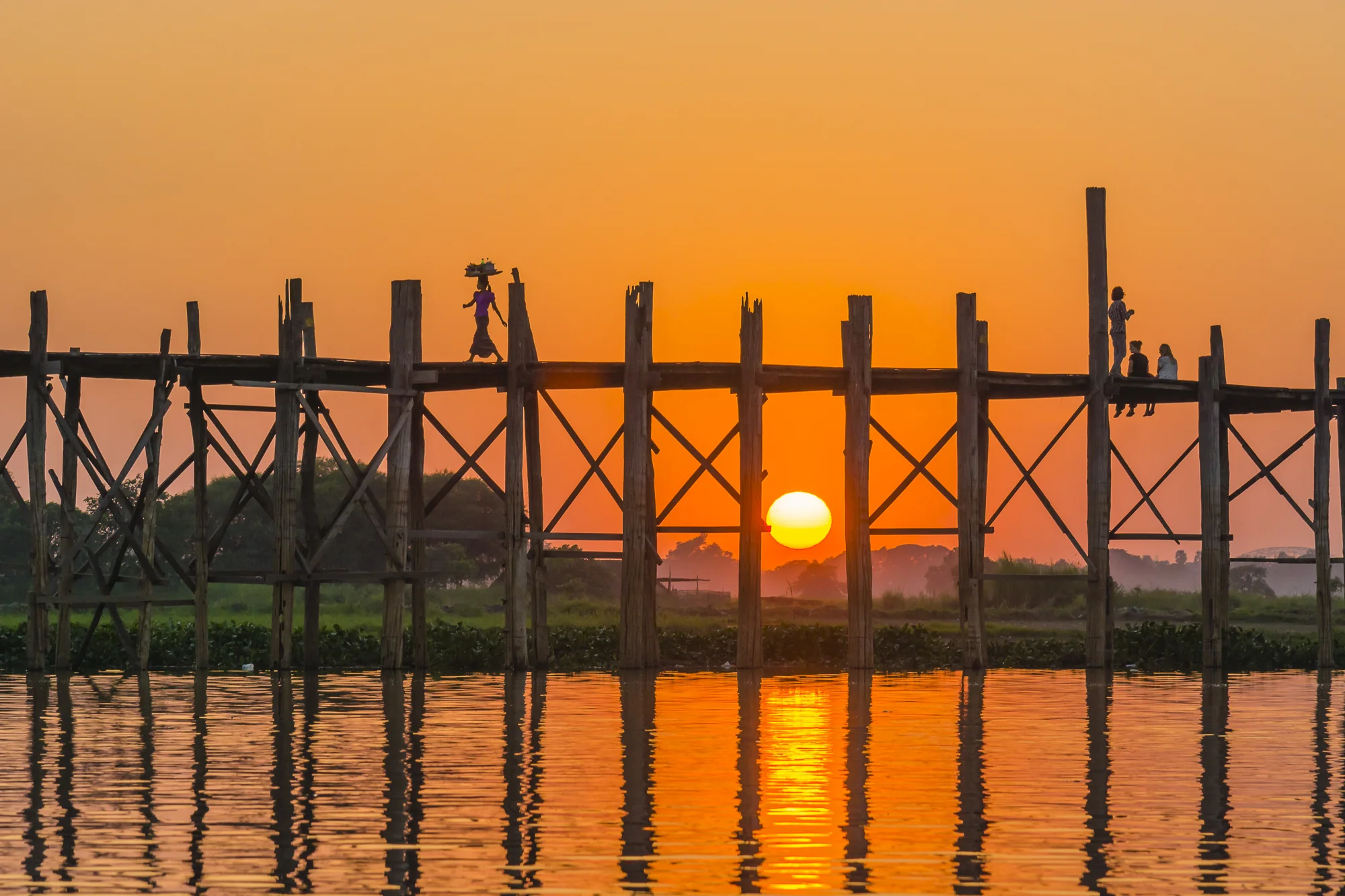 Sunset at U-Bein bridge, Amarapura, Myanmar.